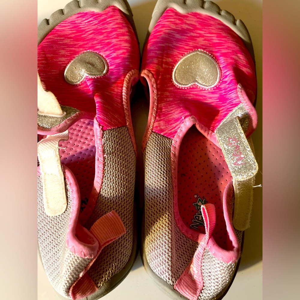 Pink water shoes.